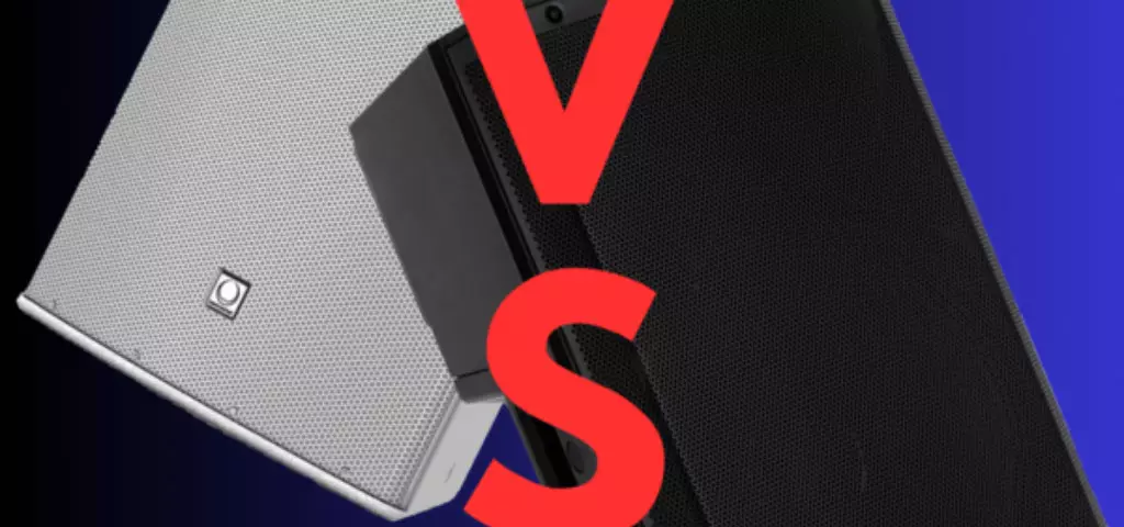 The image displays two speakers placed against a blue background, with a large red letter 'V' and 'S' on either side, suggesting a versus or comparison theme. On the left side is a white speaker, which has a clean and modern design with a visible logo on the lower part. On the right side is a black speaker with a rugged design and a logo at the bottom right corner. The overall composition suggests a comparison or competition between the two speaker models or brands.